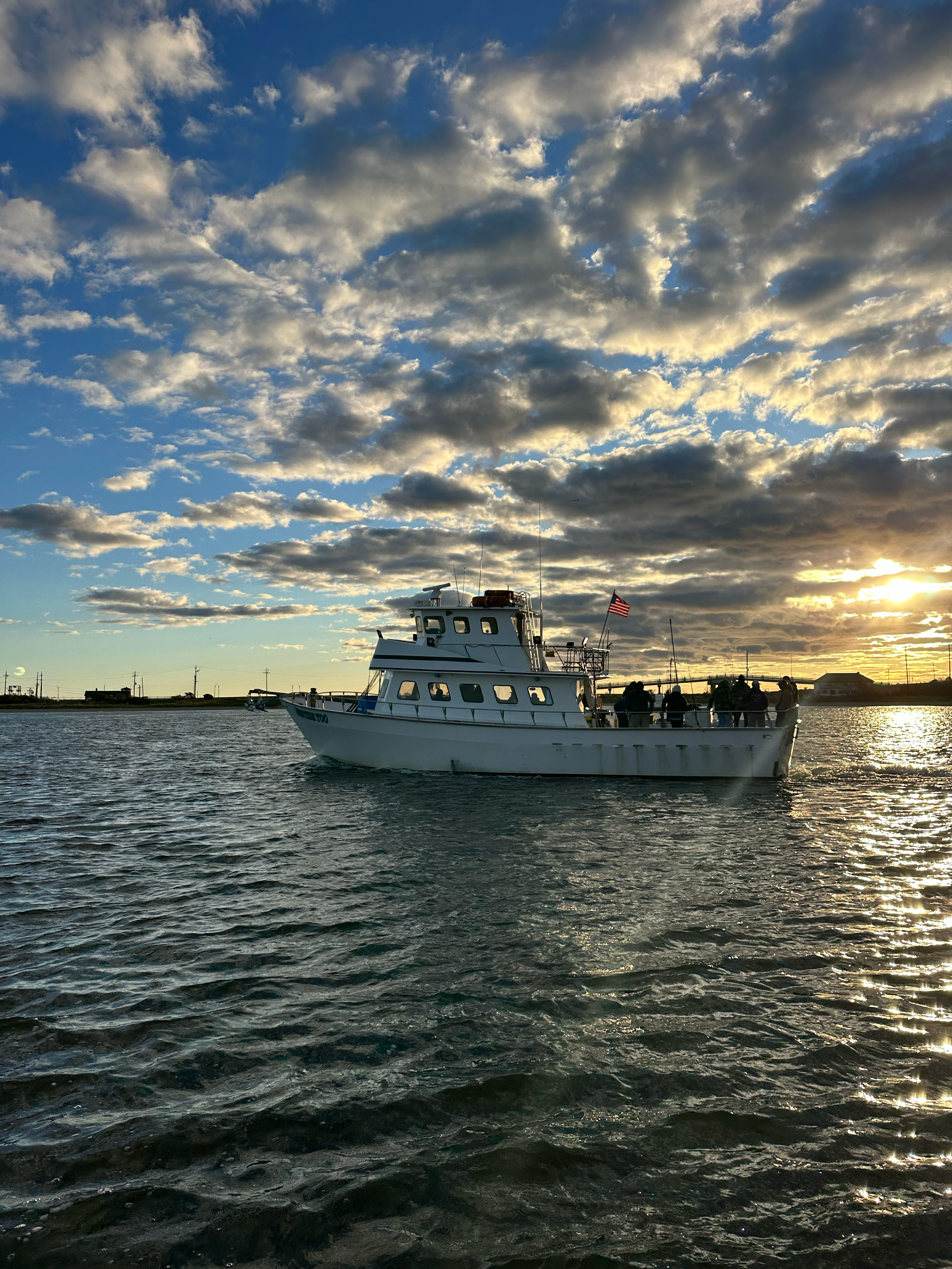 Twin Lights Cup — head boat at golden hour